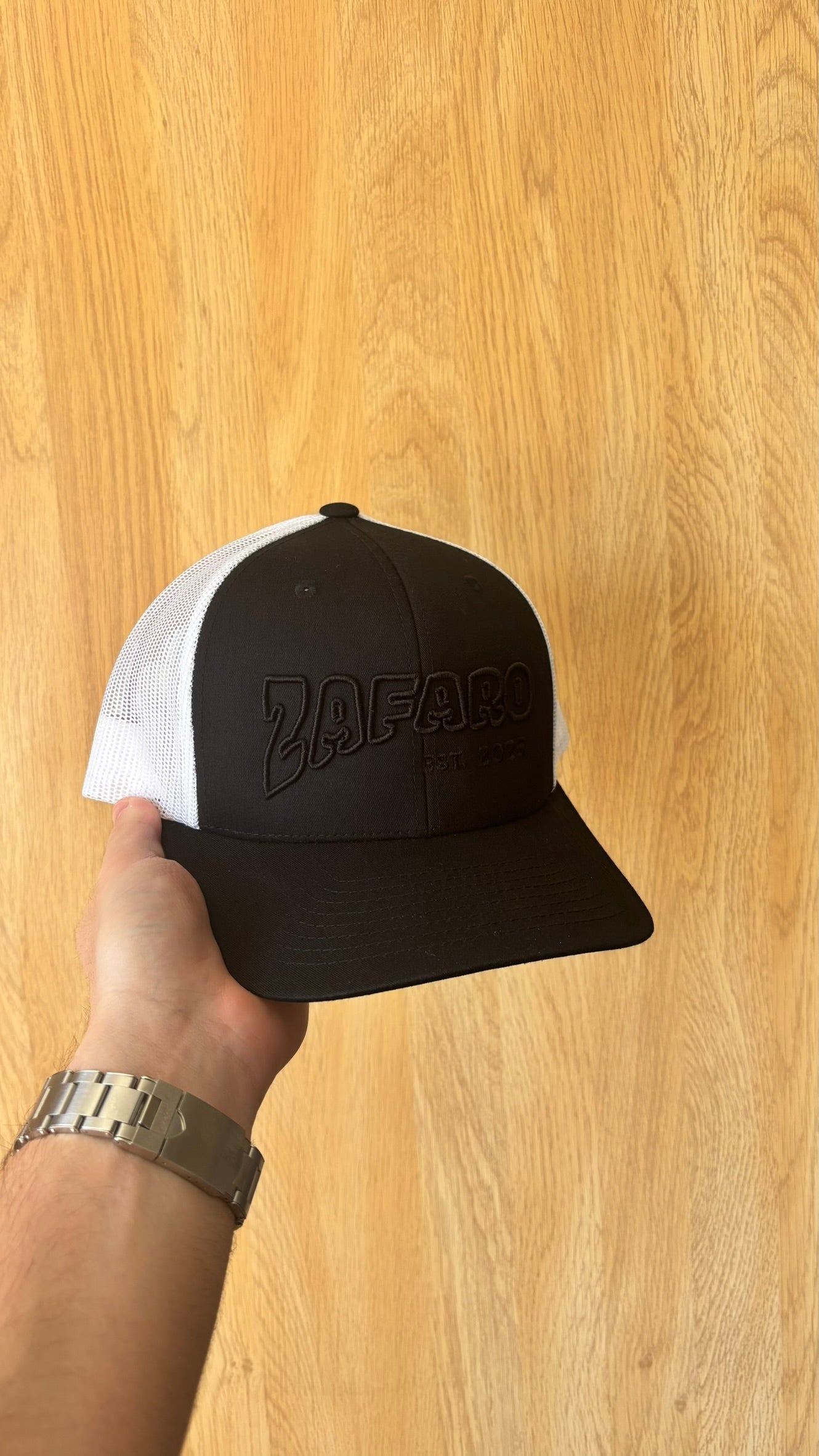The Simple Black and White Trucker Cap